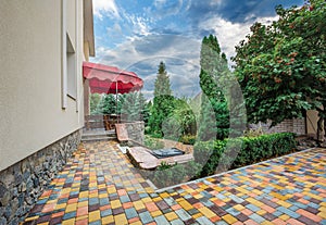 Backyard landscape design with cozy patio area