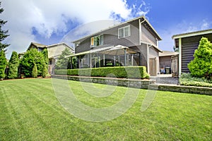 Backyard landscape with trimmed hedges