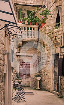 A backyard in a narrow street in Trogir Old Town