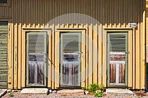 Backyard with old outhouses
