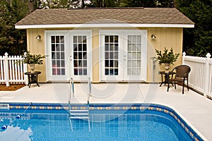 Backyard pool house photo