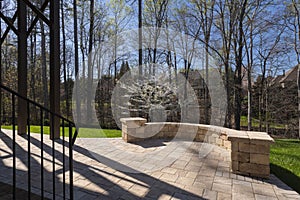 Backyard View with Concrete Pavers in the Spring