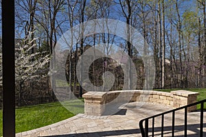 Backyard View with Concrete Pavers in the Spring