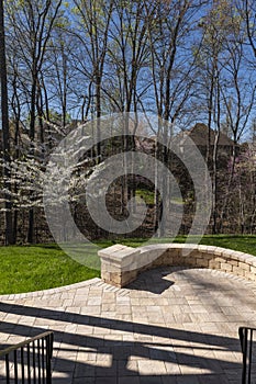 Backyard View with Concrete Pavers in the Springtime