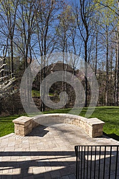 Backyard View with Concrete Pavers in the Springtime