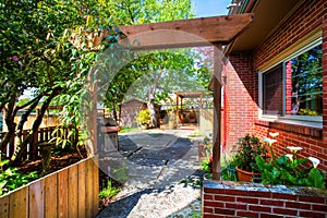 Backyard view. Entrance to garden and patio area