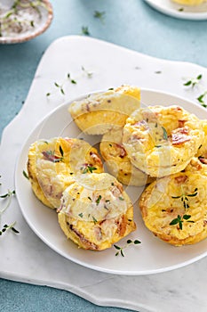 Bacon and cheddar egg muffins for breakfast
