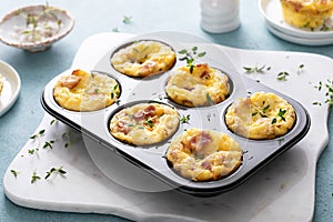 Bacon and cheddar egg muffins for breakfast