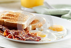 Bacon, eggs and toast breakfast photo
