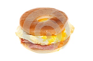 Bacon and fried egg in a toasted bagel