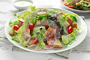 Bacon Lettuce Tomato, BLT salad with creamy dressing sauce, croutons