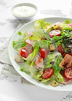 Bacon Lettuce Tomato, BLT salad with creamy dressing sauce, croutons