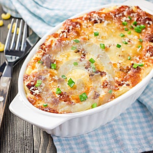 Bacon lovers mac and cheese in baking dish, square format