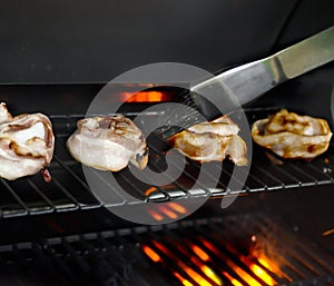 Bacon scallop on flame grill bbq