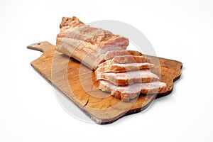 Bacon sliced on white background. pork fat with veins.