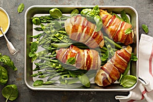 Bacon wrapped chicken breast with asparagus