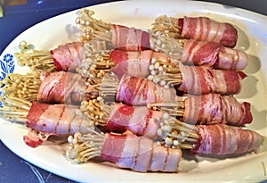 Bacon wrapped enoki mushroom ready to grill