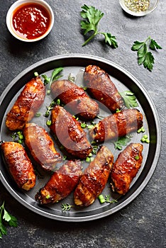 Bacon wrapped grilled chicken wings