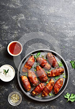 Bacon wrapped grilled chicken wings