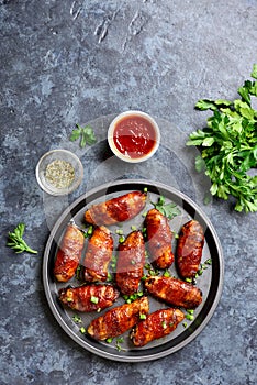 Bacon wrapped grilled chicken wings