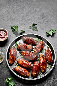 Bacon wrapped grilled chicken wings