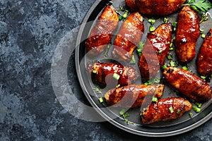Bacon wrapped grilled chicken wings