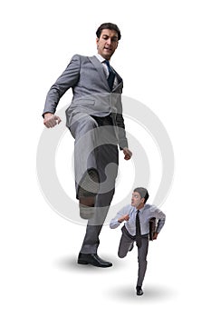 The bad angry boss kicking employee in business concept