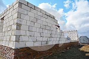 Bad construction destroys a house wall, consruction defects from autoclaved aerated concrete blocks, brick wall failure. Poorly