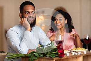 Black Couple On Unsuccessful Blind Date In Restaurant