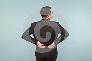 Bad feelings concept. Businessman have back, spine pain