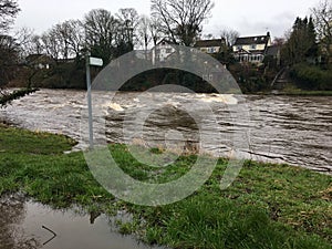 Bad flooding on the River Wharfe in Otley, Leeds, UK photo