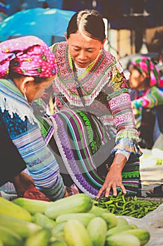 Hmong women selling vetgetable in Bac Ha market, Northern Vietnam