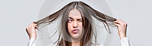 Bad hairs day. Frustrated woman having a bad hair. Woman having a bad hair, her hair is messy and tangled. Messy hair