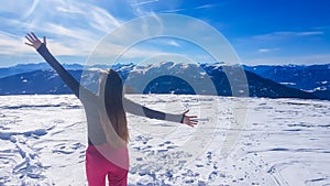 Bad Kleinkirchheim - A girl having fun in the snow with beautiful view