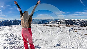 Bad Kleinkirchheim - A girl having fun in the snow with beautiful view