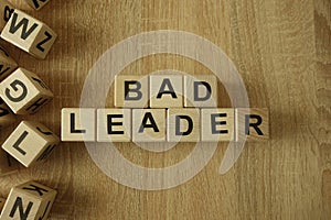 Bad leader text from wooden blocks