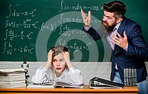 Bad news. Angry teacher shout at student in lesson. Bearded man with open mouth on angry face. Hipster being angry about