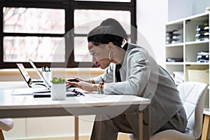 Bad Posture African American Woman Working