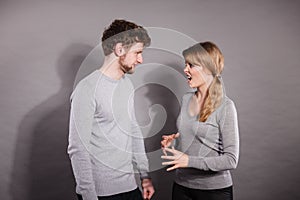 Husband and wife yelling and arguing