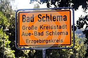 Bad-Schlema, Germany - July 16, 2023: Road sign at the entrance to Bad-Schlema, a former mining town and spa resort in the Ore