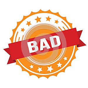BAD text on red orange ribbon stamp