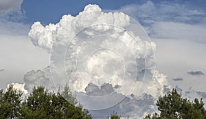 Bad weather with dark clouds. Rain and thunderstorms in the sky. Cumulus and cumulonimbus formation