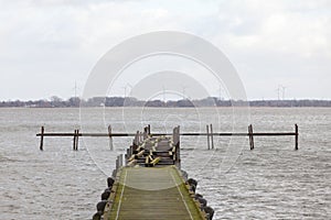 Bad weather at the lake with a landing stage