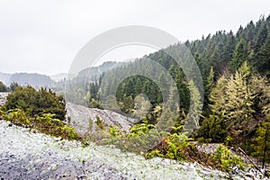 Bad weather, rain with snow at the road to Pico Ruivo, Madeira mountain photo