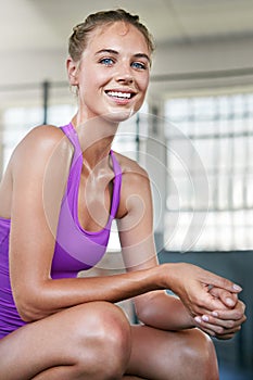 The only bad workout is the one that didnt happen. a sporty young woman taking a break after her workout.