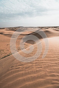 The Badain Jaran Desert is a desert in China, vertical image