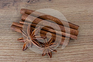 Badian with cinnamon on the table. Aromatic cinnamon sticks and star anise close-up.