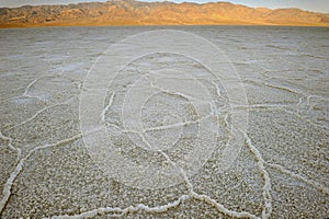 Badlands salt pan at sunrise, Death Valley, Mojave desert, Calif