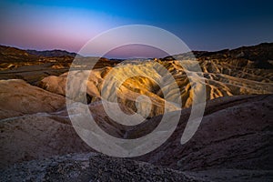 The Badlands sunset. Zabriskie Point, Death Valley National Park, CA