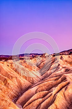 Badlands view from Zabriskie Point in Death Valley National Park at Dusk